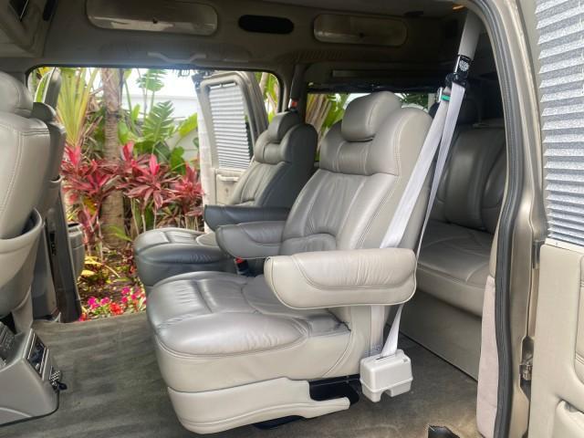 2004 Sandalwood Metallic /Neutral Chevrolet Express Passenger 1 OWNER HI TOP EXPLORER CONVERSION (1GBFG15T141) with an 5.3L Vortec 5300 V8 SFI Engine engine, Automatic transmission, located at 4701 North Dixie Hwy, Pompano Beach, FL, 33064, (954) 422-2889, 26.240938, -80.123474 - OUR WEBPAGE FLORIDACARS1.COM HAS OVER 100 PHOTOS AND FREE CARFAX LINK 2004 Chevrolet Express 1500 EXPLORER HIGH TOP CONVERSION TOP OF THE LINE LEATHER LOADED DUAL DOORS ON BOTH SIDES ONE OF A KIND FIND WILL NOT LAST IN STOCK Van 5.3L V8 F Gasoline 20 MPG Rear Wheel Drive Features ABS Brakes Air Cond - Photo#81