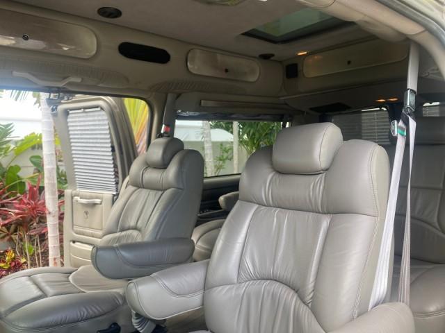 2004 Sandalwood Metallic /Neutral Chevrolet Express Passenger 1 OWNER HI TOP EXPLORER CONVERSION (1GBFG15T141) with an 5.3L Vortec 5300 V8 SFI Engine engine, Automatic transmission, located at 4701 North Dixie Hwy, Pompano Beach, FL, 33064, (954) 422-2889, 26.240938, -80.123474 - OUR WEBPAGE FLORIDACARS1.COM HAS OVER 100 PHOTOS AND FREE CARFAX LINK 2004 Chevrolet Express 1500 EXPLORER HIGH TOP CONVERSION TOP OF THE LINE LEATHER LOADED DUAL DOORS ON BOTH SIDES ONE OF A KIND FIND WILL NOT LAST IN STOCK Van 5.3L V8 F Gasoline 20 MPG Rear Wheel Drive Features ABS Brakes Air Cond - Photo#82