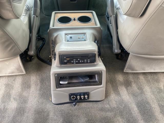 2004 Sandalwood Metallic /Neutral Chevrolet Express Passenger 1 OWNER HI TOP EXPLORER CONVERSION (1GBFG15T141) with an 5.3L Vortec 5300 V8 SFI Engine engine, Automatic transmission, located at 4701 North Dixie Hwy, Pompano Beach, FL, 33064, (954) 422-2889, 26.240938, -80.123474 - OUR WEBPAGE FLORIDACARS1.COM HAS OVER 100 PHOTOS AND FREE CARFAX LINK 2004 Chevrolet Express 1500 EXPLORER HIGH TOP CONVERSION TOP OF THE LINE LEATHER LOADED DUAL DOORS ON BOTH SIDES ONE OF A KIND FIND WILL NOT LAST IN STOCK Van 5.3L V8 F Gasoline 20 MPG Rear Wheel Drive Features ABS Brakes Air Cond - Photo#83