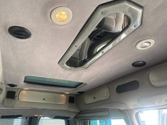 2004 Sandalwood Metallic /Neutral Chevrolet Express Passenger 1 OWNER HI TOP EXPLORER CONVERSION (1GBFG15T141) with an 5.3L Vortec 5300 V8 SFI Engine engine, Automatic transmission, located at 4701 North Dixie Hwy, Pompano Beach, FL, 33064, (954) 422-2889, 26.240938, -80.123474 - OUR WEBPAGE FLORIDACARS1.COM HAS OVER 100 PHOTOS AND FREE CARFAX LINK 2004 Chevrolet Express 1500 EXPLORER HIGH TOP CONVERSION TOP OF THE LINE LEATHER LOADED DUAL DOORS ON BOTH SIDES ONE OF A KIND FIND WILL NOT LAST IN STOCK Van 5.3L V8 F Gasoline 20 MPG Rear Wheel Drive Features ABS Brakes Air Cond - Photo#93