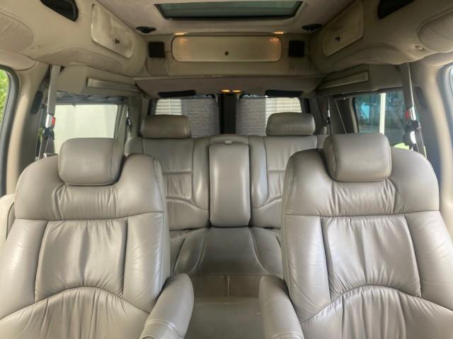 2004 Sandalwood Metallic /Neutral Chevrolet Express Passenger 1 OWNER HI TOP EXPLORER CONVERSION (1GBFG15T141) with an 5.3L Vortec 5300 V8 SFI Engine engine, Automatic transmission, located at 4701 North Dixie Hwy, Pompano Beach, FL, 33064, (954) 422-2889, 26.240938, -80.123474 - OUR WEBPAGE FLORIDACARS1.COM HAS OVER 100 PHOTOS AND FREE CARFAX LINK 2004 Chevrolet Express 1500 EXPLORER HIGH TOP CONVERSION TOP OF THE LINE LEATHER LOADED DUAL DOORS ON BOTH SIDES ONE OF A KIND FIND WILL NOT LAST IN STOCK Van 5.3L V8 F Gasoline 20 MPG Rear Wheel Drive Features ABS Brakes Air Cond - Photo#94