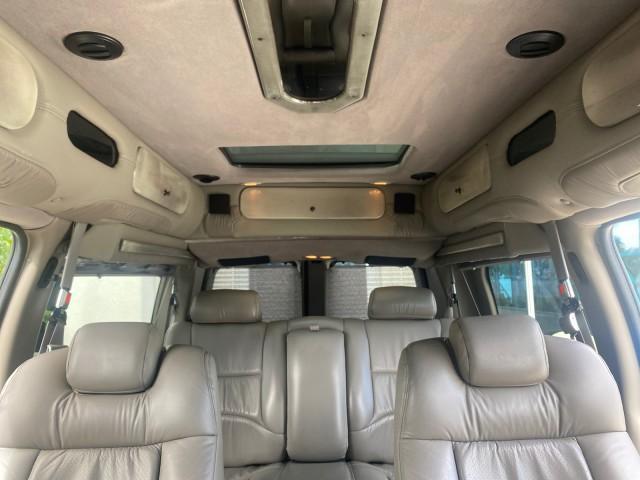 2004 Sandalwood Metallic /Neutral Chevrolet Express Passenger 1 OWNER HI TOP EXPLORER CONVERSION (1GBFG15T141) with an 5.3L Vortec 5300 V8 SFI Engine engine, Automatic transmission, located at 4701 North Dixie Hwy, Pompano Beach, FL, 33064, (954) 422-2889, 26.240938, -80.123474 - OUR WEBPAGE FLORIDACARS1.COM HAS OVER 100 PHOTOS AND FREE CARFAX LINK 2004 Chevrolet Express 1500 EXPLORER HIGH TOP CONVERSION TOP OF THE LINE LEATHER LOADED DUAL DOORS ON BOTH SIDES ONE OF A KIND FIND WILL NOT LAST IN STOCK Van 5.3L V8 F Gasoline 20 MPG Rear Wheel Drive Features ABS Brakes Air Cond - Photo#95