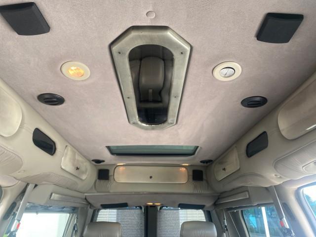 2004 Sandalwood Metallic /Neutral Chevrolet Express Passenger 1 OWNER HI TOP EXPLORER CONVERSION (1GBFG15T141) with an 5.3L Vortec 5300 V8 SFI Engine engine, Automatic transmission, located at 4701 North Dixie Hwy, Pompano Beach, FL, 33064, (954) 422-2889, 26.240938, -80.123474 - OUR WEBPAGE FLORIDACARS1.COM HAS OVER 100 PHOTOS AND FREE CARFAX LINK 2004 Chevrolet Express 1500 EXPLORER HIGH TOP CONVERSION TOP OF THE LINE LEATHER LOADED DUAL DOORS ON BOTH SIDES ONE OF A KIND FIND WILL NOT LAST IN STOCK Van 5.3L V8 F Gasoline 20 MPG Rear Wheel Drive Features ABS Brakes Air Cond - Photo#96