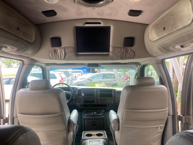 2004 Sandalwood Metallic /Neutral Chevrolet Express Passenger 1 OWNER HI TOP EXPLORER CONVERSION (1GBFG15T141) with an 5.3L Vortec 5300 V8 SFI Engine engine, Automatic transmission, located at 4701 North Dixie Hwy, Pompano Beach, FL, 33064, (954) 422-2889, 26.240938, -80.123474 - OUR WEBPAGE FLORIDACARS1.COM HAS OVER 100 PHOTOS AND FREE CARFAX LINK 2004 Chevrolet Express 1500 EXPLORER HIGH TOP CONVERSION TOP OF THE LINE LEATHER LOADED DUAL DOORS ON BOTH SIDES ONE OF A KIND FIND WILL NOT LAST IN STOCK Van 5.3L V8 F Gasoline 20 MPG Rear Wheel Drive Features ABS Brakes Air Cond - Photo#97