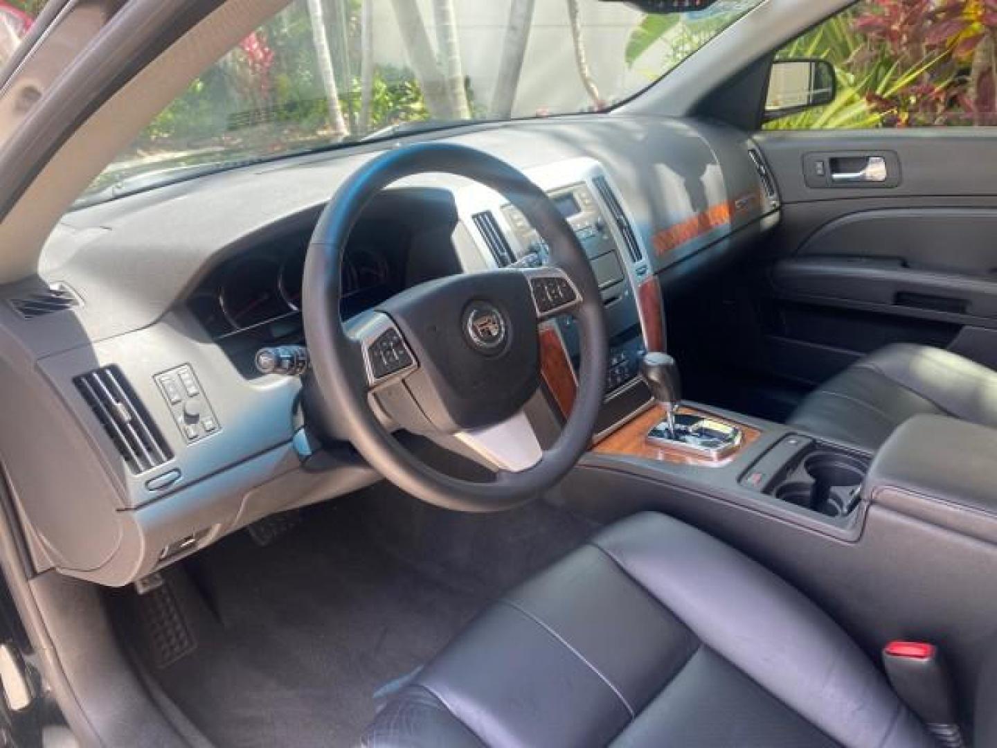 2008 Black Raven /Ebony Cadillac STS RWD 1 OWNERLOW MILES 39813 (1G6DW67V380) with an 3.6L VVT V6 DI Engine engine, Automatic transmission, located at 4701 North Dixie Hwy, Pompano Beach, FL, 33064, (954) 422-2889, 26.240938, -80.123474 - OUR WEBPAGE FLORIDACARS1.COM HAS OVER 100 PHOTOS AND FREE CARFAX LINK 2008 Cadillac STS V6 Sedan 4 DR 3.6L V6 F Gasoline 26 MPG Features A/C Seat(s) ABS Brakes Air Conditioning Alloy Wheels AM/FM Stereo Automatic Transmission Bluetooth Technology BOSE Sound System CD Audio Cruise Control Front Seat- Photo#48
