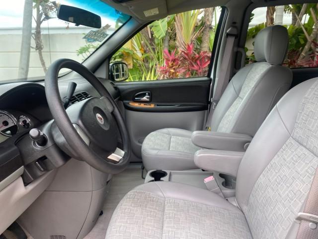 2005 Silver Pearl /Grey Saturn Relay Relay 2 VAN LOW MILES 64,057 1 OWNER (5GZDV03LX5D) with an 3.5L OHV SMPI 12-Valve V6 Aluminum Engine engine, Automatic transmission, located at 4701 North Dixie Hwy, Pompano Beach, FL, 33064, (954) 422-2889, 26.240938, -80.123474 - OUR WEBPAGE FLORIDACARS1.COM HAS OVER 100 PHOTOS AND FREE CARFAX LINK 2005 Saturn Relay 2 1 OWNER AUTO CHECK IS CORRECT CARFAX STATES 2 OWNERS THIS IS INCORRECT Van 3.5L V6 F Gasoline MPG 24 Front Wheel Drive Features ABS Brakes Air Conditioning Alloy Wheels AM/FM Stereo Automatic Transmission CD Au - Photo#45