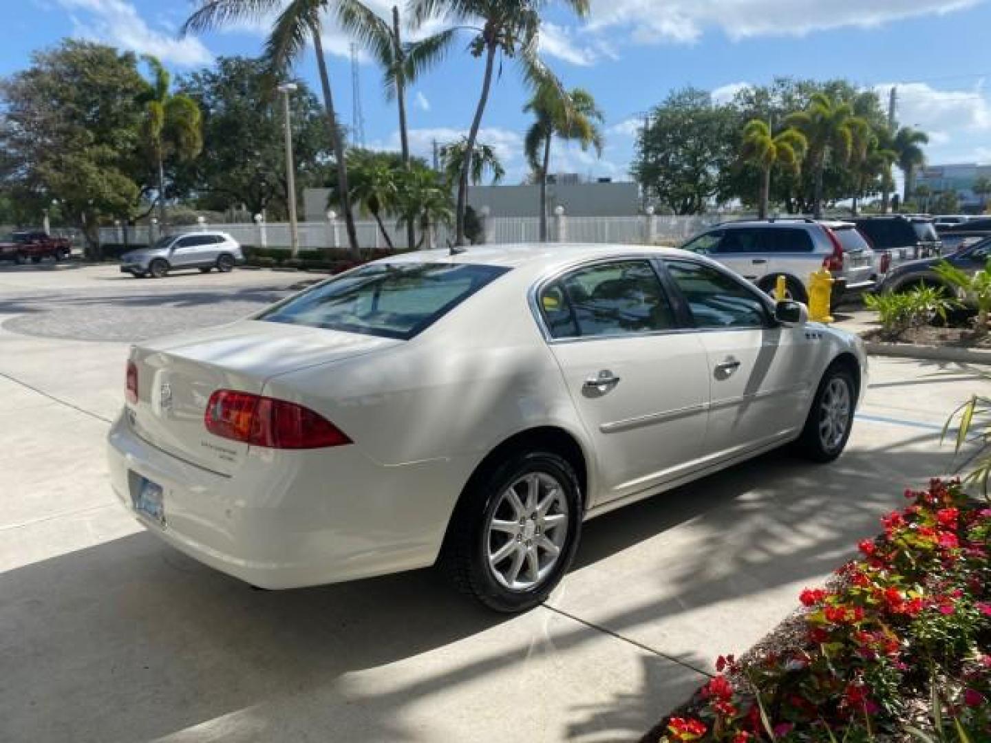 2008 White Opal /Cocoa/Cashmere Buick Lucerne CXL LOW MILES 40,989 1 OWNER (1G4HD57298U) with an 3.8L V6 SFI Engine engine, Automatic transmission, located at 4701 North Dixie Hwy, Pompano Beach, FL, 33064, (954) 422-2889, 26.240938, -80.123474 - OUR WEBPAGE FLORIDACARS1.COM HAS OVER 100 PHOTOS AND FREE CARFAX LINK 2008 Buick Lucerne CXL 1 OWNER CARFAX MINOR BUMPER SCUFF AUTO CHECK 1 OWNER NO ACCIDENTS Sedan 4 DR 3.8L V6 F Gasoline 28 MPG Front Wheel Drive Features ABS Brakes Air Conditioning Alloy Wheels AM/FM Stereo Automatic Transmission- Photo#7