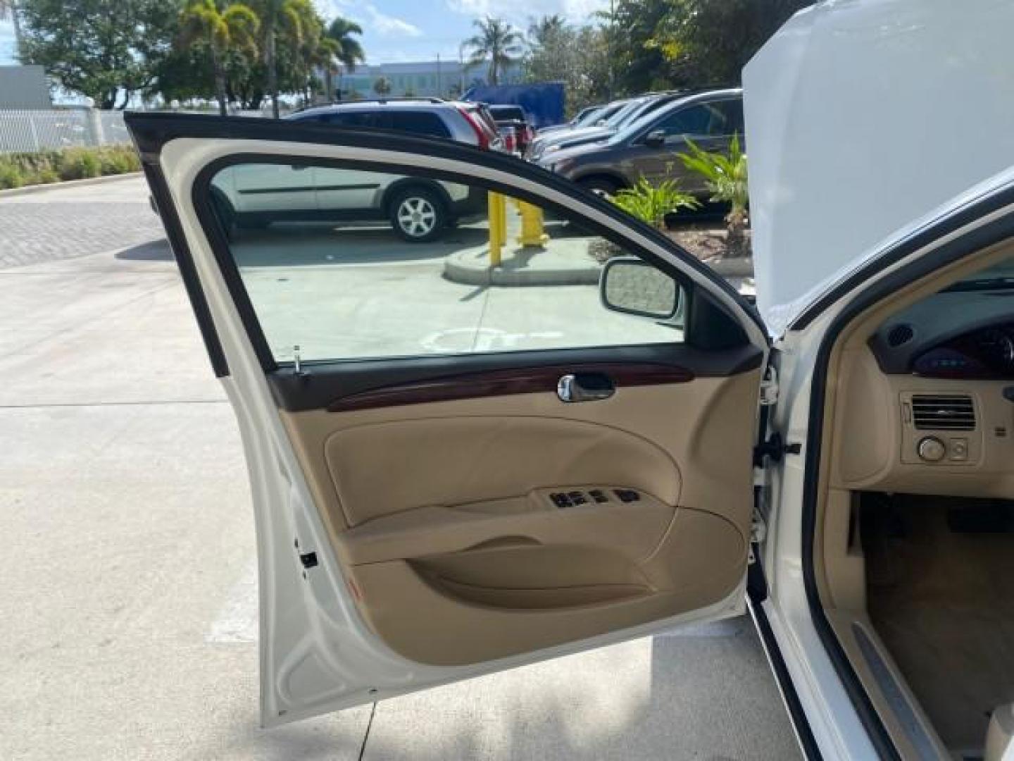 2008 White Opal /Cocoa/Cashmere Buick Lucerne CXL LOW MILES 40,989 1 OWNER (1G4HD57298U) with an 3.8L V6 SFI Engine engine, Automatic transmission, located at 4701 North Dixie Hwy, Pompano Beach, FL, 33064, (954) 422-2889, 26.240938, -80.123474 - OUR WEBPAGE FLORIDACARS1.COM HAS OVER 100 PHOTOS AND FREE CARFAX LINK 2008 Buick Lucerne CXL 1 OWNER CARFAX MINOR BUMPER SCUFF AUTO CHECK 1 OWNER NO ACCIDENTS Sedan 4 DR 3.8L V6 F Gasoline 28 MPG Front Wheel Drive Features ABS Brakes Air Conditioning Alloy Wheels AM/FM Stereo Automatic Transmission- Photo#9