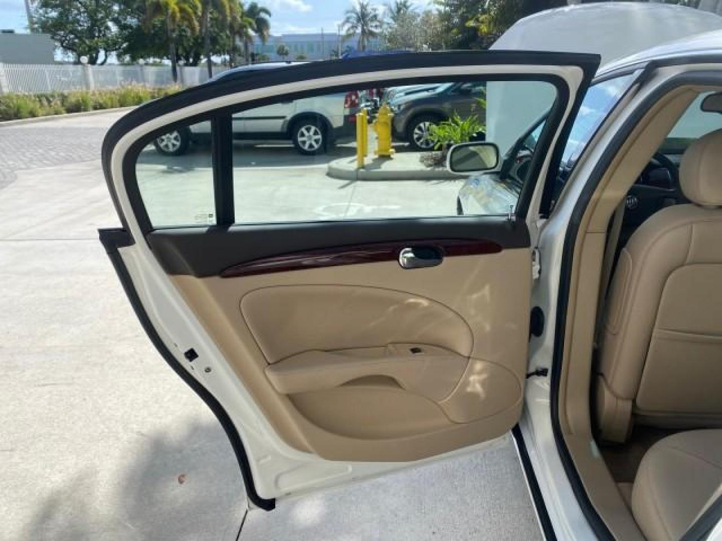 2008 White Opal /Cocoa/Cashmere Buick Lucerne CXL LOW MILES 40,989 1 OWNER (1G4HD57298U) with an 3.8L V6 SFI Engine engine, Automatic transmission, located at 4701 North Dixie Hwy, Pompano Beach, FL, 33064, (954) 422-2889, 26.240938, -80.123474 - OUR WEBPAGE FLORIDACARS1.COM HAS OVER 100 PHOTOS AND FREE CARFAX LINK 2008 Buick Lucerne CXL 1 OWNER CARFAX MINOR BUMPER SCUFF AUTO CHECK 1 OWNER NO ACCIDENTS Sedan 4 DR 3.8L V6 F Gasoline 28 MPG Front Wheel Drive Features ABS Brakes Air Conditioning Alloy Wheels AM/FM Stereo Automatic Transmission- Photo#13