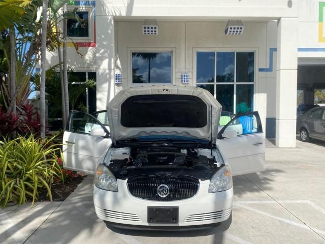 2008 White Opal /Cocoa/Cashmere Buick Lucerne CXL LOW MILES 40,989 1 OWNER (1G4HD57298U) with an 3.8L V6 SFI Engine engine, Automatic transmission, located at 4701 North Dixie Hwy, Pompano Beach, FL, 33064, (954) 422-2889, 26.240938, -80.123474 - OUR WEBPAGE FLORIDACARS1.COM HAS OVER 100 PHOTOS AND FREE CARFAX LINK 2008 Buick Lucerne CXL 1 OWNER CARFAX MINOR BUMPER SCUFF AUTO CHECK 1 OWNER NO ACCIDENTS Sedan 4 DR 3.8L V6 F Gasoline 28 MPG Front Wheel Drive Features ABS Brakes Air Conditioning Alloy Wheels AM/FM Stereo Automatic Transmission - Photo#16
