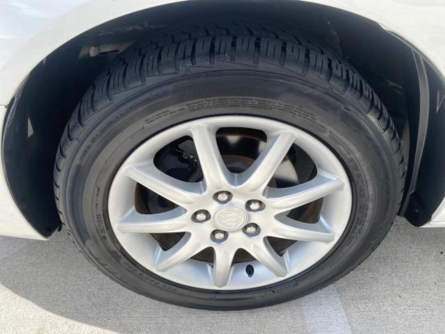 2008 White Opal /Cocoa/Cashmere Buick Lucerne CXL LOW MILES 40,989 1 OWNER (1G4HD57298U) with an 3.8L V6 SFI Engine engine, Automatic transmission, located at 4701 North Dixie Hwy, Pompano Beach, FL, 33064, (954) 422-2889, 26.240938, -80.123474 - OUR WEBPAGE FLORIDACARS1.COM HAS OVER 100 PHOTOS AND FREE CARFAX LINK 2008 Buick Lucerne CXL 1 OWNER CARFAX MINOR BUMPER SCUFF AUTO CHECK 1 OWNER NO ACCIDENTS Sedan 4 DR 3.8L V6 F Gasoline 28 MPG Front Wheel Drive Features ABS Brakes Air Conditioning Alloy Wheels AM/FM Stereo Automatic Transmission- Photo#19