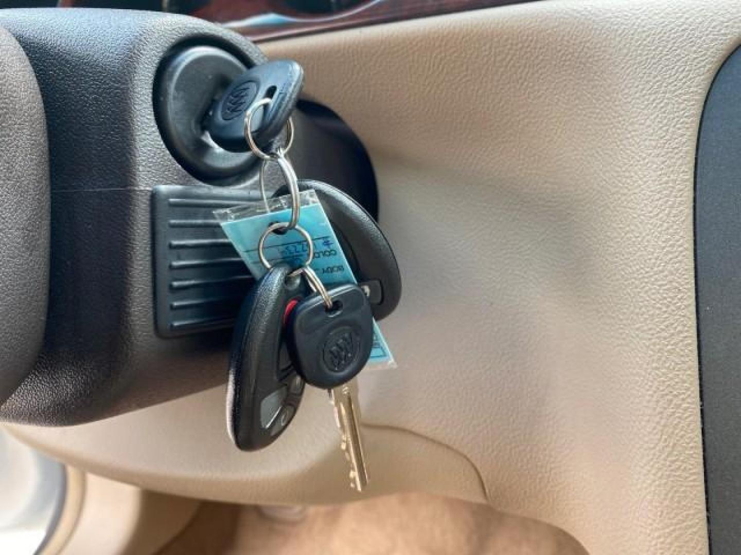 2008 White Opal /Cocoa/Cashmere Buick Lucerne CXL LOW MILES 40,989 1 OWNER (1G4HD57298U) with an 3.8L V6 SFI Engine engine, Automatic transmission, located at 4701 North Dixie Hwy, Pompano Beach, FL, 33064, (954) 422-2889, 26.240938, -80.123474 - OUR WEBPAGE FLORIDACARS1.COM HAS OVER 100 PHOTOS AND FREE CARFAX LINK 2008 Buick Lucerne CXL 1 OWNER CARFAX MINOR BUMPER SCUFF AUTO CHECK 1 OWNER NO ACCIDENTS Sedan 4 DR 3.8L V6 F Gasoline 28 MPG Front Wheel Drive Features ABS Brakes Air Conditioning Alloy Wheels AM/FM Stereo Automatic Transmission- Photo#56