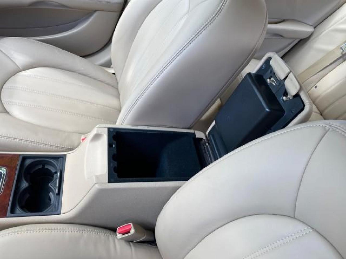 2008 White Opal /Cocoa/Cashmere Buick Lucerne CXL LOW MILES 40,989 1 OWNER (1G4HD57298U) with an 3.8L V6 SFI Engine engine, Automatic transmission, located at 4701 North Dixie Hwy, Pompano Beach, FL, 33064, (954) 422-2889, 26.240938, -80.123474 - OUR WEBPAGE FLORIDACARS1.COM HAS OVER 100 PHOTOS AND FREE CARFAX LINK 2008 Buick Lucerne CXL 1 OWNER CARFAX MINOR BUMPER SCUFF AUTO CHECK 1 OWNER NO ACCIDENTS Sedan 4 DR 3.8L V6 F Gasoline 28 MPG Front Wheel Drive Features ABS Brakes Air Conditioning Alloy Wheels AM/FM Stereo Automatic Transmission- Photo#65