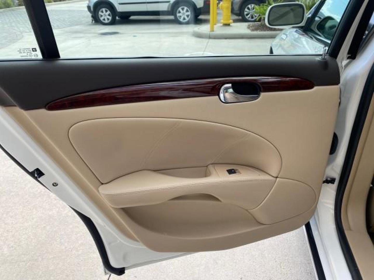 2008 White Opal /Cocoa/Cashmere Buick Lucerne CXL LOW MILES 40,989 1 OWNER (1G4HD57298U) with an 3.8L V6 SFI Engine engine, Automatic transmission, located at 4701 North Dixie Hwy, Pompano Beach, FL, 33064, (954) 422-2889, 26.240938, -80.123474 - OUR WEBPAGE FLORIDACARS1.COM HAS OVER 100 PHOTOS AND FREE CARFAX LINK 2008 Buick Lucerne CXL 1 OWNER CARFAX MINOR BUMPER SCUFF AUTO CHECK 1 OWNER NO ACCIDENTS Sedan 4 DR 3.8L V6 F Gasoline 28 MPG Front Wheel Drive Features ABS Brakes Air Conditioning Alloy Wheels AM/FM Stereo Automatic Transmission- Photo#76