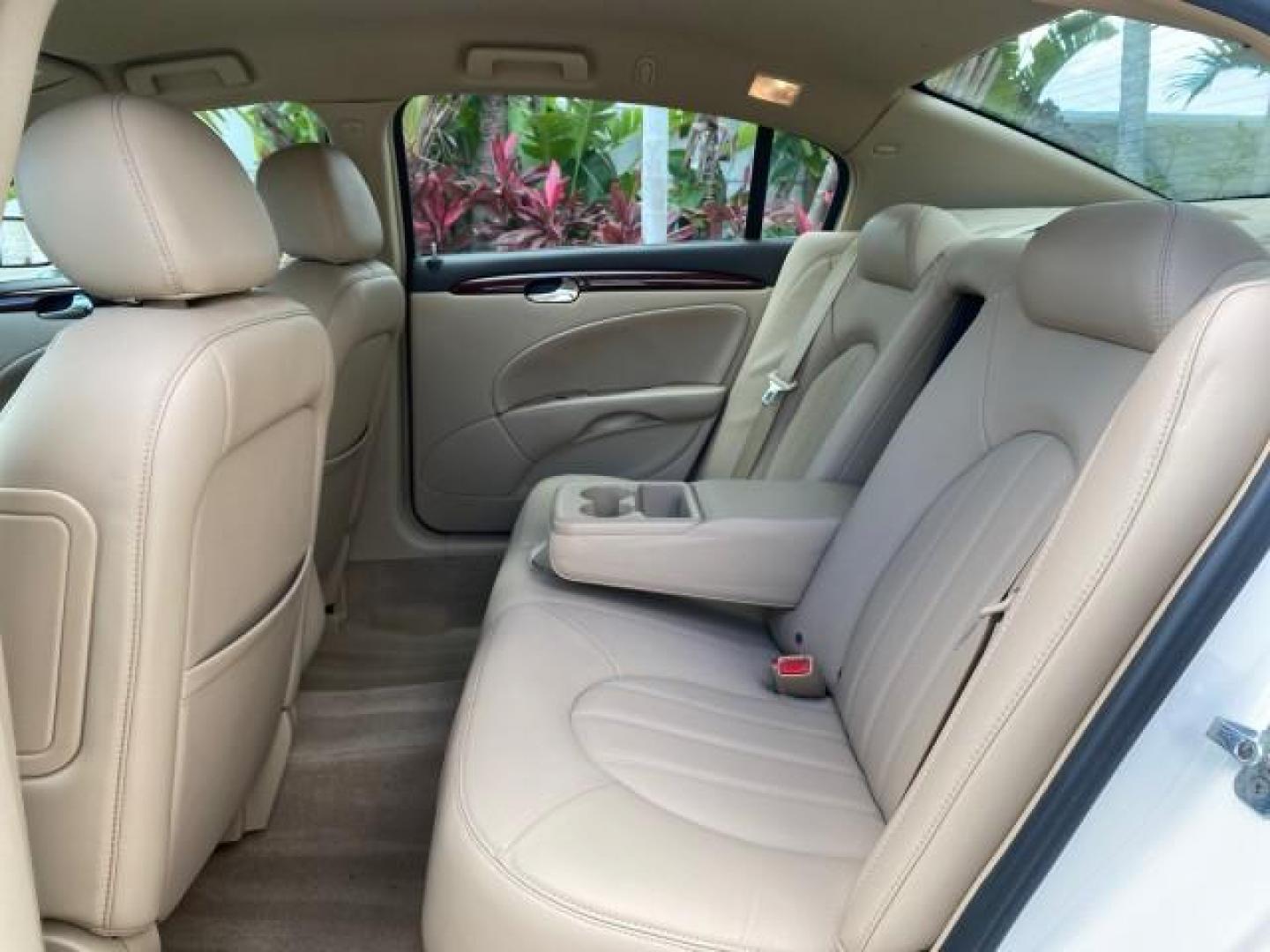 2008 White Opal /Cocoa/Cashmere Buick Lucerne CXL LOW MILES 40,989 1 OWNER (1G4HD57298U) with an 3.8L V6 SFI Engine engine, Automatic transmission, located at 4701 North Dixie Hwy, Pompano Beach, FL, 33064, (954) 422-2889, 26.240938, -80.123474 - OUR WEBPAGE FLORIDACARS1.COM HAS OVER 100 PHOTOS AND FREE CARFAX LINK 2008 Buick Lucerne CXL 1 OWNER CARFAX MINOR BUMPER SCUFF AUTO CHECK 1 OWNER NO ACCIDENTS Sedan 4 DR 3.8L V6 F Gasoline 28 MPG Front Wheel Drive Features ABS Brakes Air Conditioning Alloy Wheels AM/FM Stereo Automatic Transmission- Photo#77