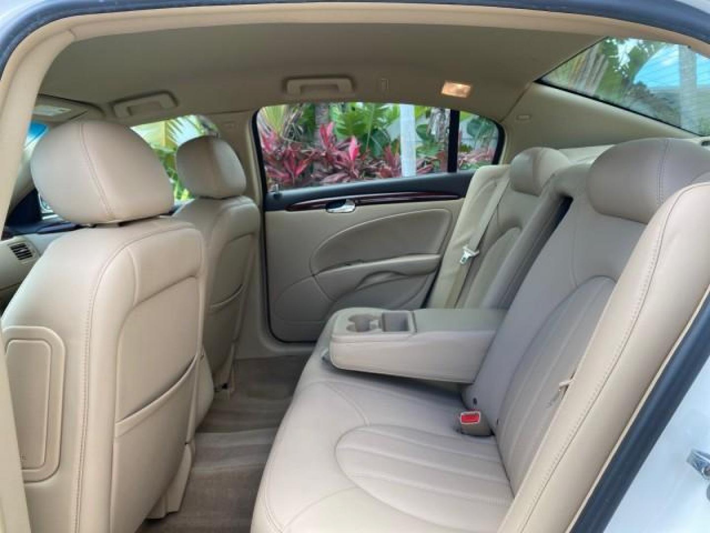 2008 White Opal /Cocoa/Cashmere Buick Lucerne CXL LOW MILES 40,989 1 OWNER (1G4HD57298U) with an 3.8L V6 SFI Engine engine, Automatic transmission, located at 4701 North Dixie Hwy, Pompano Beach, FL, 33064, (954) 422-2889, 26.240938, -80.123474 - OUR WEBPAGE FLORIDACARS1.COM HAS OVER 100 PHOTOS AND FREE CARFAX LINK 2008 Buick Lucerne CXL 1 OWNER CARFAX MINOR BUMPER SCUFF AUTO CHECK 1 OWNER NO ACCIDENTS Sedan 4 DR 3.8L V6 F Gasoline 28 MPG Front Wheel Drive Features ABS Brakes Air Conditioning Alloy Wheels AM/FM Stereo Automatic Transmission- Photo#78