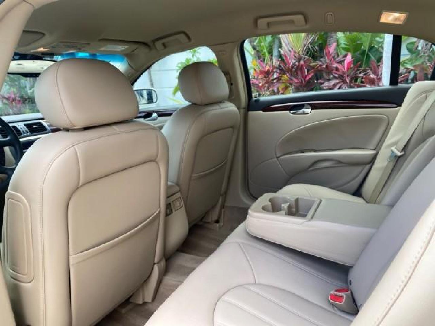 2008 White Opal /Cocoa/Cashmere Buick Lucerne CXL LOW MILES 40,989 1 OWNER (1G4HD57298U) with an 3.8L V6 SFI Engine engine, Automatic transmission, located at 4701 North Dixie Hwy, Pompano Beach, FL, 33064, (954) 422-2889, 26.240938, -80.123474 - OUR WEBPAGE FLORIDACARS1.COM HAS OVER 100 PHOTOS AND FREE CARFAX LINK 2008 Buick Lucerne CXL 1 OWNER CARFAX MINOR BUMPER SCUFF AUTO CHECK 1 OWNER NO ACCIDENTS Sedan 4 DR 3.8L V6 F Gasoline 28 MPG Front Wheel Drive Features ABS Brakes Air Conditioning Alloy Wheels AM/FM Stereo Automatic Transmission- Photo#80