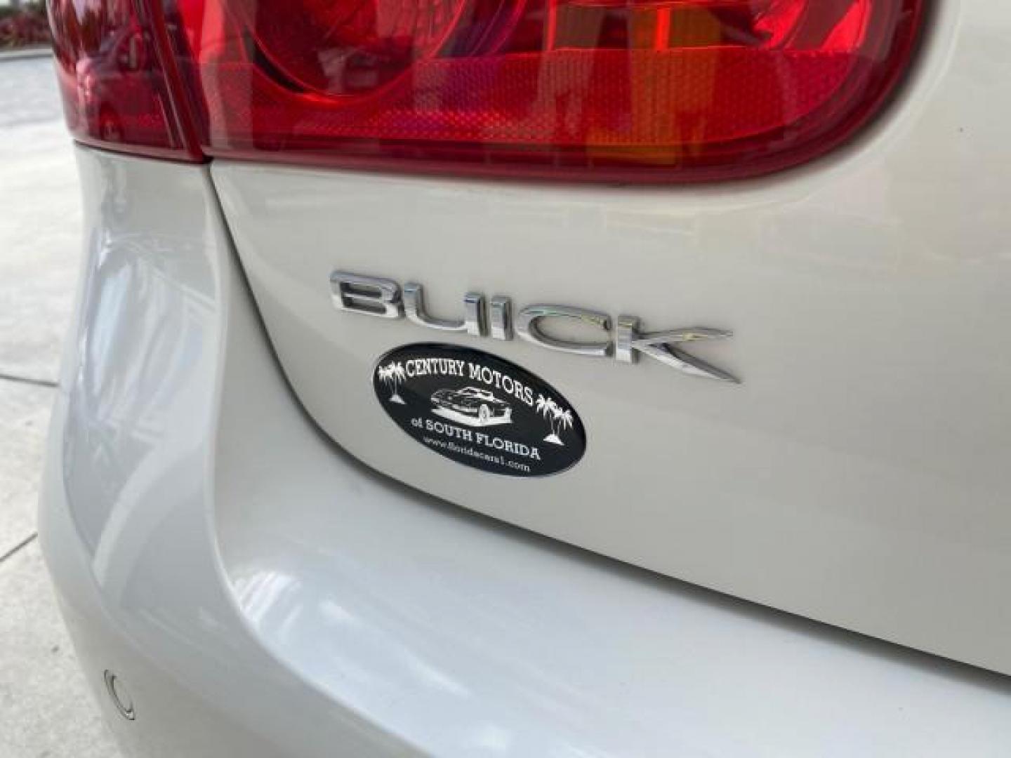 2008 White Opal /Cocoa/Cashmere Buick Lucerne CXL LOW MILES 40,989 1 OWNER (1G4HD57298U) with an 3.8L V6 SFI Engine engine, Automatic transmission, located at 4701 North Dixie Hwy, Pompano Beach, FL, 33064, (954) 422-2889, 26.240938, -80.123474 - OUR WEBPAGE FLORIDACARS1.COM HAS OVER 100 PHOTOS AND FREE CARFAX LINK 2008 Buick Lucerne CXL 1 OWNER CARFAX MINOR BUMPER SCUFF AUTO CHECK 1 OWNER NO ACCIDENTS Sedan 4 DR 3.8L V6 F Gasoline 28 MPG Front Wheel Drive Features ABS Brakes Air Conditioning Alloy Wheels AM/FM Stereo Automatic Transmission- Photo#91