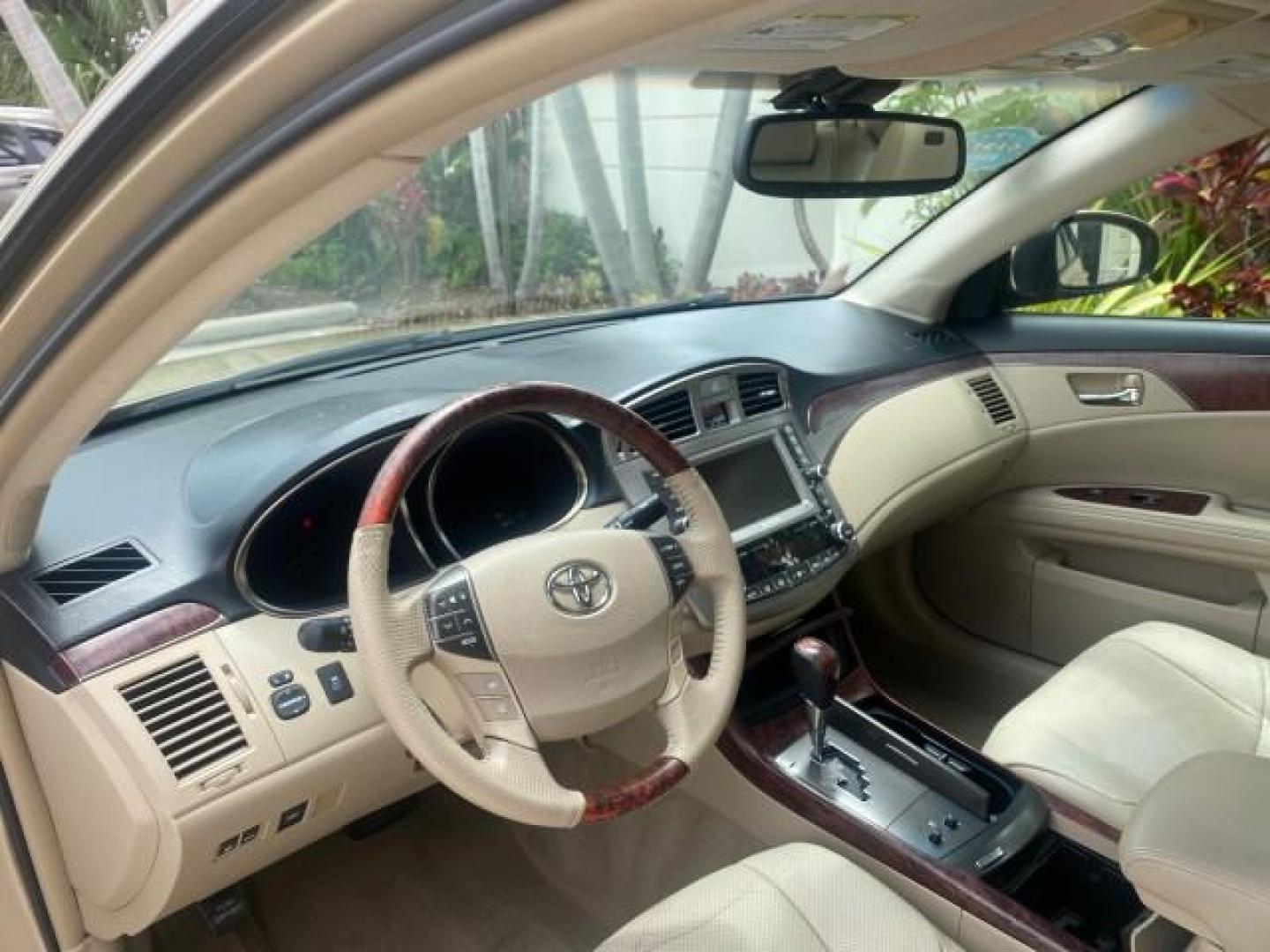 2011 Sandy Beach Metallic /Ivory Toyota Avalon Limited LEATHER LOADED SUNROOF (4T1BK3DB8BU) with an 3.5L DOHC EFI 24-Valve V6 Engine engine, Automatic transmission, located at 4701 North Dixie Hwy, Pompano Beach, FL, 33064, (954) 422-2889, 26.240938, -80.123474 - OUR WEBPAGE FLORIDACARS1.COM HAS OVER 100 PHOTOS AND FREE CARFAX LINK 2011 Toyota Avalon LIMITED LEATHER SUNROOF THE DASH HAS ABSOLUTELY NO CRACKS Sedan 4 DR 3.5L V6 F DOHC 24V Gasoline 29 MPG Front Wheel Drive Features A/C Seat(s) ABS Brakes Air Conditioning Alloy Wheels AM/FM Stereo Automatic Tran- Photo#47