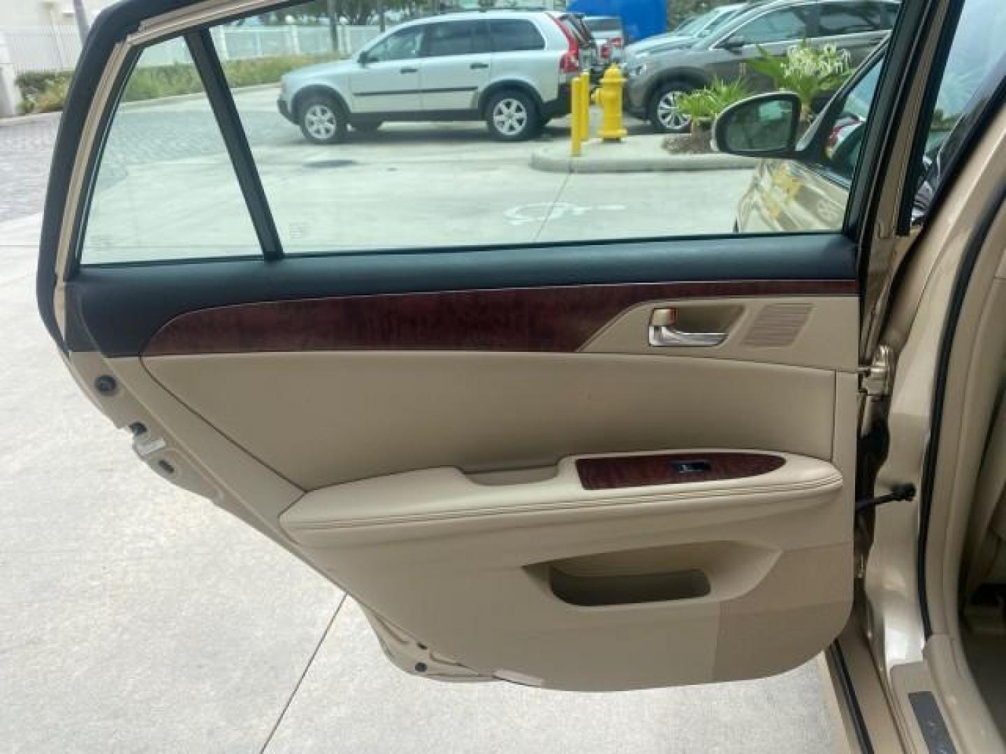 2011 Sandy Beach Metallic /Ivory Toyota Avalon Limited LEATHER LOADED SUNROOF (4T1BK3DB8BU) with an 3.5L DOHC EFI 24-Valve V6 Engine engine, Automatic transmission, located at 4701 North Dixie Hwy, Pompano Beach, FL, 33064, (954) 422-2889, 26.240938, -80.123474 - OUR WEBPAGE FLORIDACARS1.COM HAS OVER 100 PHOTOS AND FREE CARFAX LINK 2011 Toyota Avalon LIMITED LEATHER SUNROOF THE DASH HAS ABSOLUTELY NO CRACKS Sedan 4 DR 3.5L V6 F DOHC 24V Gasoline 29 MPG Front Wheel Drive Features A/C Seat(s) ABS Brakes Air Conditioning Alloy Wheels AM/FM Stereo Automatic Tran- Photo#83