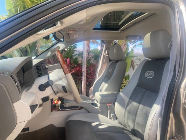 2006 Light Khaki Metallic /Dark Khaki/Lght Graystone Jeep Grand Cherokee Overland LOW MILES 57,372 1 OWNER 4WD (1J8HR68226C) with an 5.7L Hemi Multi Displacement Engine engine, Automatic transmission, located at 4701 North Dixie Hwy, Pompano Beach, FL, 33064, (954) 422-2889, 26.240938, -80.123474 - OUR WEBPAGE FLORIDACARS1.COM HAS OVER 100 PHOTOS AND FREE CARFAX LINK 2006 Jeep Grand Cherokee Overland 1 OWNER 4WD 4 Door Wagon/Sport Utility 5.7L V8 F Gasoline 19 MPG Rear Wheel Drive w/ 4X4 Features 4WD/AWD ABS Brakes Air Conditioning Alloy Wheels AM/FM Stereo Automatic Transmission Auxiliary Aud - Photo#10