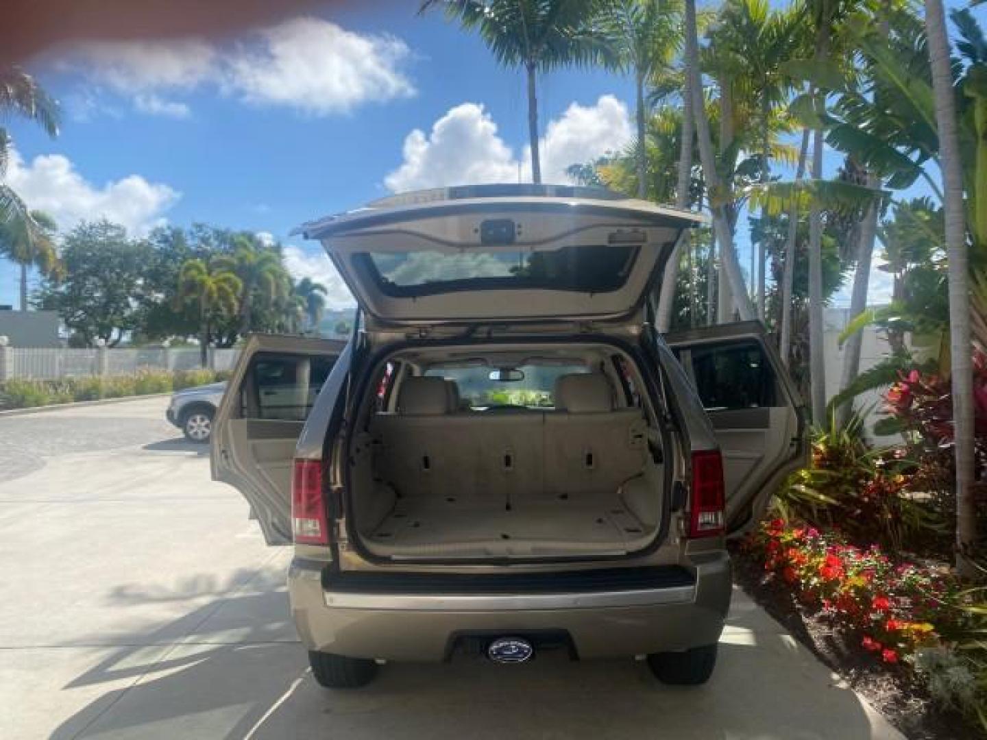 2006 Dark Khaki Pearl /Dark Khaki/Lght Graystone Jeep Grand Cherokee Overland LOW MILES 57,372 1 OWNER 4WD (1J8HR68226C) with an 5.7L Hemi Multi Displacement Engine engine, Automatic transmission, located at 4701 North Dixie Hwy, Pompano Beach, FL, 33064, (954) 422-2889, 26.240938, -80.123474 - OUR WEBPAGE FLORIDACARS1.COM HAS OVER 100 PHOTOS AND FREE CARFAX LINK 2006 Jeep Grand Cherokee Overland 1 OWNER 4WD 4 Door Wagon/Sport Utility 5.7L V8 F Gasoline 19 MPG Rear Wheel Drive w/ 4X4 Features 4WD/AWD ABS Brakes Air Conditioning Alloy Wheels AM/FM Stereo Automatic Transmission Auxiliary Aud- Photo#15