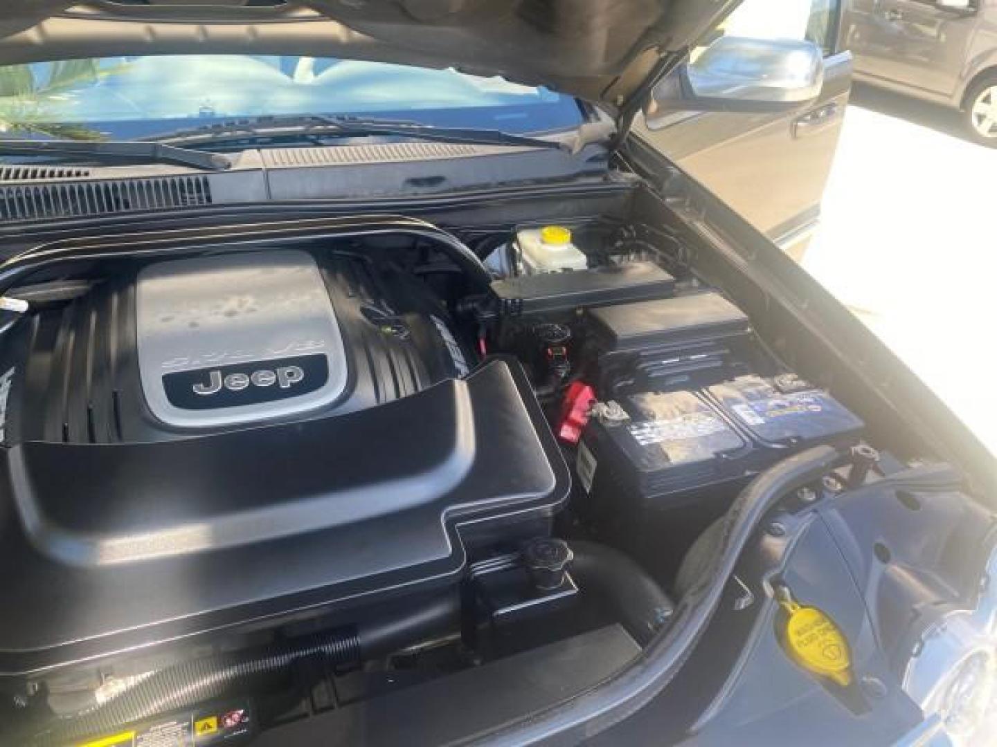 2006 Dark Khaki Pearl /Dark Khaki/Lght Graystone Jeep Grand Cherokee Overland LOW MILES 57,372 1 OWNER 4WD (1J8HR68226C) with an 5.7L Hemi Multi Displacement Engine engine, Automatic transmission, located at 4701 North Dixie Hwy, Pompano Beach, FL, 33064, (954) 422-2889, 26.240938, -80.123474 - OUR WEBPAGE FLORIDACARS1.COM HAS OVER 100 PHOTOS AND FREE CARFAX LINK 2006 Jeep Grand Cherokee Overland 1 OWNER 4WD 4 Door Wagon/Sport Utility 5.7L V8 F Gasoline 19 MPG Rear Wheel Drive w/ 4X4 Features 4WD/AWD ABS Brakes Air Conditioning Alloy Wheels AM/FM Stereo Automatic Transmission Auxiliary Aud- Photo#25