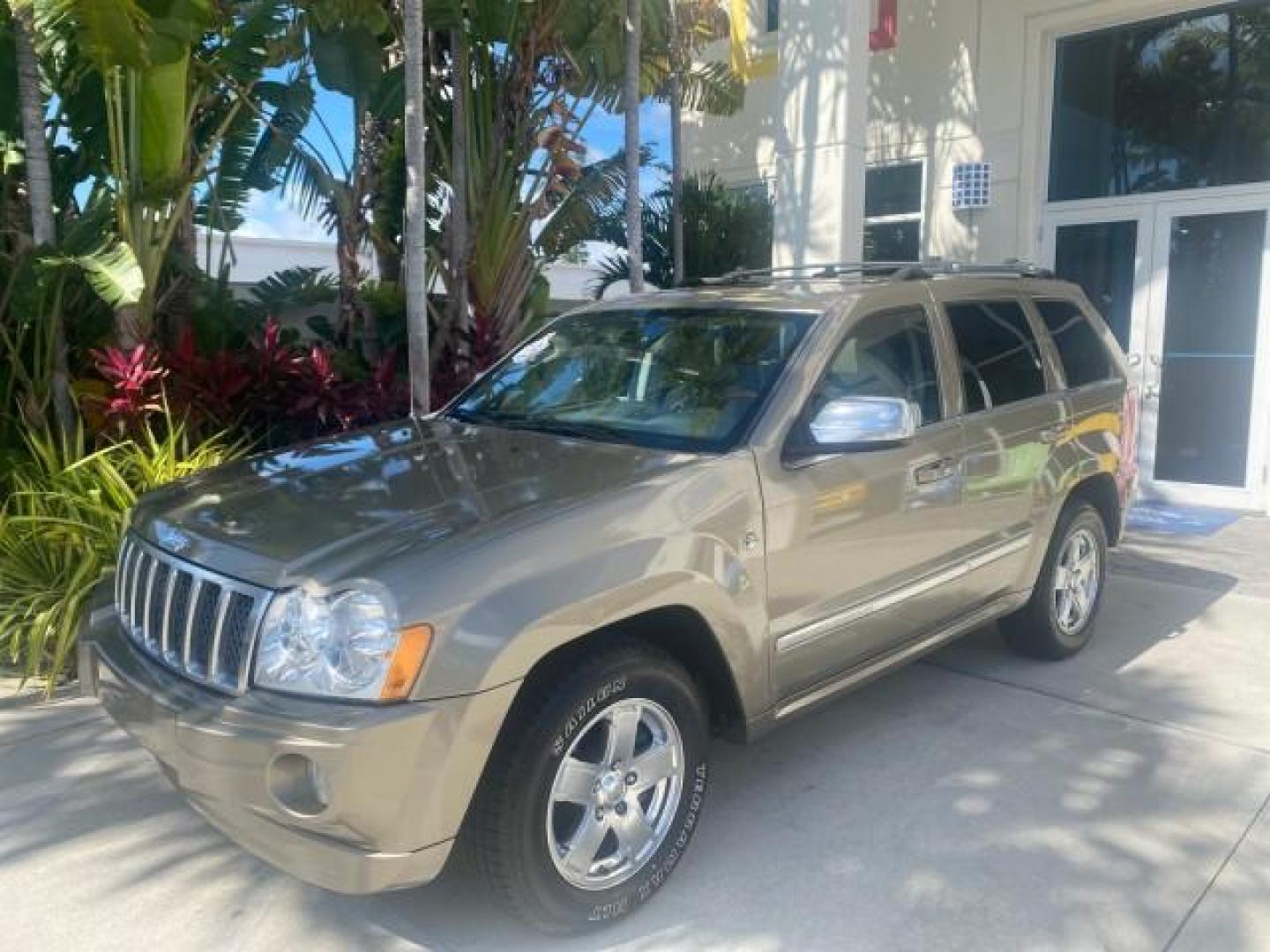 2006 Dark Khaki Pearl /Dark Khaki/Lght Graystone Jeep Grand Cherokee Overland LOW MILES 57,372 1 OWNER 4WD (1J8HR68226C) with an 5.7L Hemi Multi Displacement Engine engine, Automatic transmission, located at 4701 North Dixie Hwy, Pompano Beach, FL, 33064, (954) 422-2889, 26.240938, -80.123474 - OUR WEBPAGE FLORIDACARS1.COM HAS OVER 100 PHOTOS AND FREE CARFAX LINK 2006 Jeep Grand Cherokee Overland 1 OWNER 4WD 4 Door Wagon/Sport Utility 5.7L V8 F Gasoline 19 MPG Rear Wheel Drive w/ 4X4 Features 4WD/AWD ABS Brakes Air Conditioning Alloy Wheels AM/FM Stereo Automatic Transmission Auxiliary Aud- Photo#29