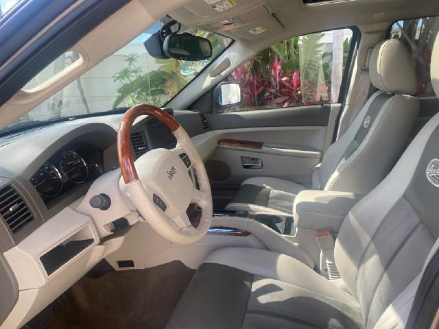 2006 Dark Khaki Pearl /Dark Khaki/Lght Graystone Jeep Grand Cherokee Overland LOW MILES 57,372 1 OWNER 4WD (1J8HR68226C) with an 5.7L Hemi Multi Displacement Engine engine, Automatic transmission, located at 4701 North Dixie Hwy, Pompano Beach, FL, 33064, (954) 422-2889, 26.240938, -80.123474 - OUR WEBPAGE FLORIDACARS1.COM HAS OVER 100 PHOTOS AND FREE CARFAX LINK 2006 Jeep Grand Cherokee Overland 1 OWNER 4WD 4 Door Wagon/Sport Utility 5.7L V8 F Gasoline 19 MPG Rear Wheel Drive w/ 4X4 Features 4WD/AWD ABS Brakes Air Conditioning Alloy Wheels AM/FM Stereo Automatic Transmission Auxiliary Aud- Photo#46