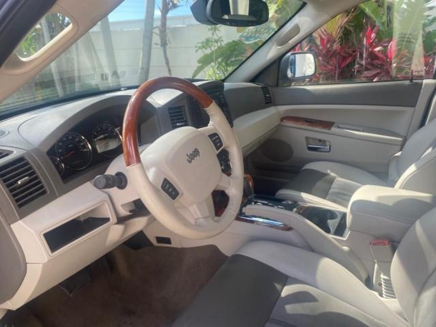 2006 Dark Khaki Pearl /Dark Khaki/Lght Graystone Jeep Grand Cherokee Overland LOW MILES 57,372 1 OWNER 4WD (1J8HR68226C) with an 5.7L Hemi Multi Displacement Engine engine, Automatic transmission, located at 4701 North Dixie Hwy, Pompano Beach, FL, 33064, (954) 422-2889, 26.240938, -80.123474 - OUR WEBPAGE FLORIDACARS1.COM HAS OVER 100 PHOTOS AND FREE CARFAX LINK 2006 Jeep Grand Cherokee Overland 1 OWNER 4WD 4 Door Wagon/Sport Utility 5.7L V8 F Gasoline 19 MPG Rear Wheel Drive w/ 4X4 Features 4WD/AWD ABS Brakes Air Conditioning Alloy Wheels AM/FM Stereo Automatic Transmission Auxiliary Aud- Photo#47