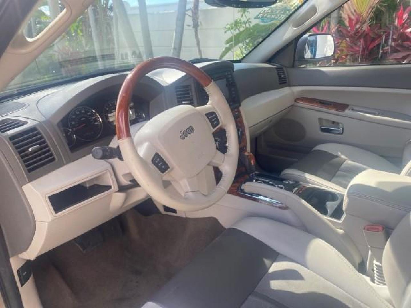 2006 Dark Khaki Pearl /Dark Khaki/Lght Graystone Jeep Grand Cherokee Overland LOW MILES 57,372 1 OWNER 4WD (1J8HR68226C) with an 5.7L Hemi Multi Displacement Engine engine, Automatic transmission, located at 4701 North Dixie Hwy, Pompano Beach, FL, 33064, (954) 422-2889, 26.240938, -80.123474 - OUR WEBPAGE FLORIDACARS1.COM HAS OVER 100 PHOTOS AND FREE CARFAX LINK 2006 Jeep Grand Cherokee Overland 1 OWNER 4WD 4 Door Wagon/Sport Utility 5.7L V8 F Gasoline 19 MPG Rear Wheel Drive w/ 4X4 Features 4WD/AWD ABS Brakes Air Conditioning Alloy Wheels AM/FM Stereo Automatic Transmission Auxiliary Aud- Photo#48