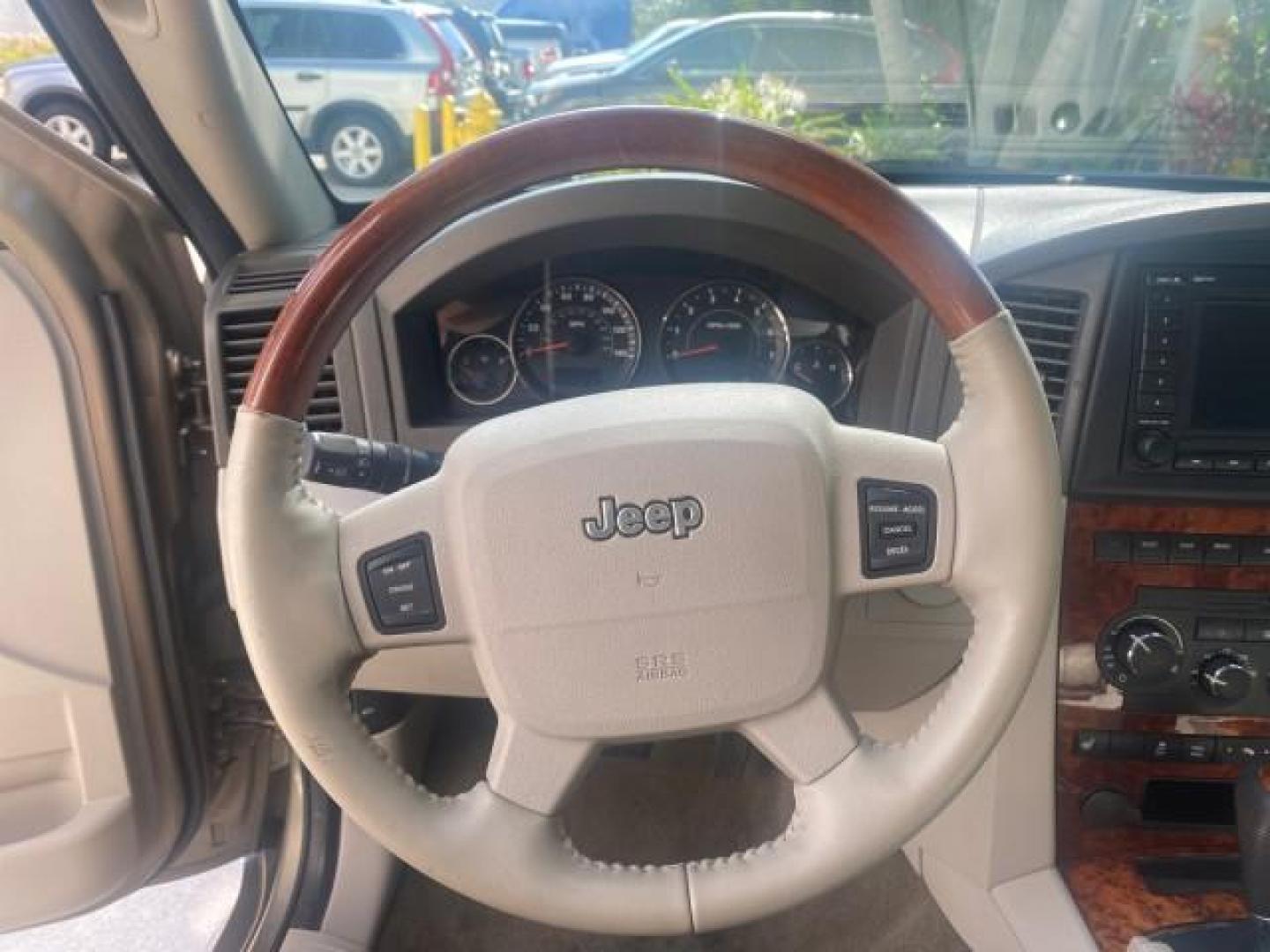 2006 Dark Khaki Pearl /Dark Khaki/Lght Graystone Jeep Grand Cherokee Overland LOW MILES 57,372 1 OWNER 4WD (1J8HR68226C) with an 5.7L Hemi Multi Displacement Engine engine, Automatic transmission, located at 4701 North Dixie Hwy, Pompano Beach, FL, 33064, (954) 422-2889, 26.240938, -80.123474 - OUR WEBPAGE FLORIDACARS1.COM HAS OVER 100 PHOTOS AND FREE CARFAX LINK 2006 Jeep Grand Cherokee Overland 1 OWNER 4WD 4 Door Wagon/Sport Utility 5.7L V8 F Gasoline 19 MPG Rear Wheel Drive w/ 4X4 Features 4WD/AWD ABS Brakes Air Conditioning Alloy Wheels AM/FM Stereo Automatic Transmission Auxiliary Aud- Photo#50
