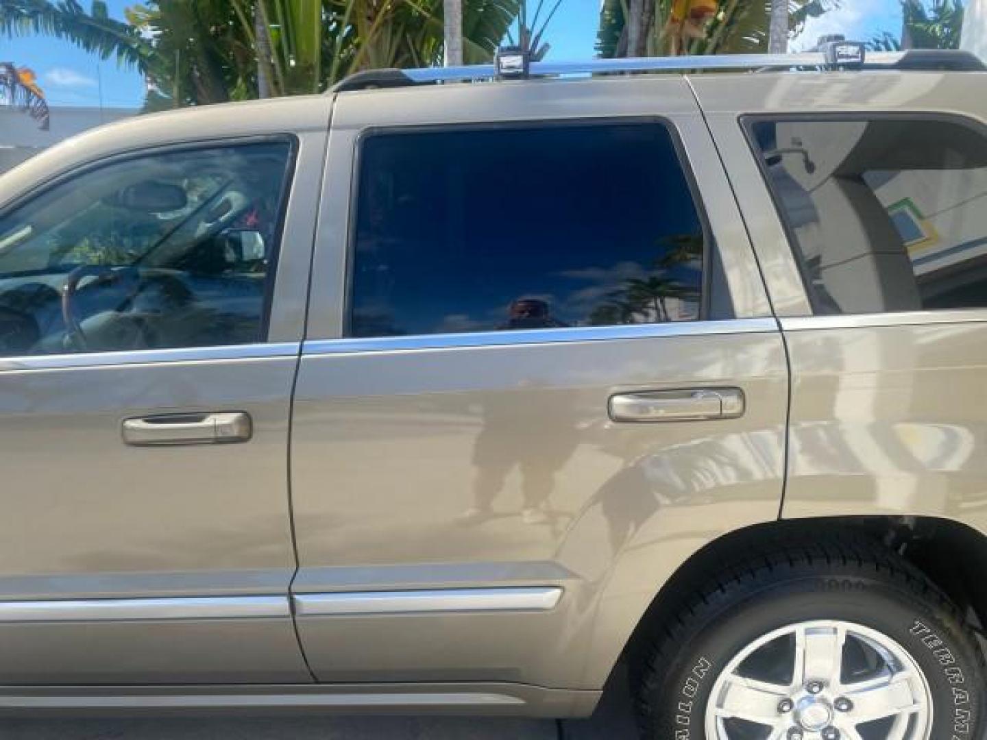 2006 Dark Khaki Pearl /Dark Khaki/Lght Graystone Jeep Grand Cherokee Overland LOW MILES 57,372 1 OWNER 4WD (1J8HR68226C) with an 5.7L Hemi Multi Displacement Engine engine, Automatic transmission, located at 4701 North Dixie Hwy, Pompano Beach, FL, 33064, (954) 422-2889, 26.240938, -80.123474 - OUR WEBPAGE FLORIDACARS1.COM HAS OVER 100 PHOTOS AND FREE CARFAX LINK 2006 Jeep Grand Cherokee Overland 1 OWNER 4WD 4 Door Wagon/Sport Utility 5.7L V8 F Gasoline 19 MPG Rear Wheel Drive w/ 4X4 Features 4WD/AWD ABS Brakes Air Conditioning Alloy Wheels AM/FM Stereo Automatic Transmission Auxiliary Aud- Photo#76