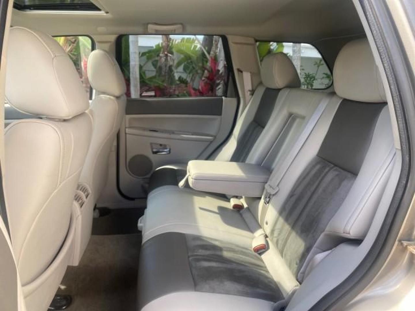 2006 Dark Khaki Pearl /Dark Khaki/Lght Graystone Jeep Grand Cherokee Overland LOW MILES 57,372 1 OWNER 4WD (1J8HR68226C) with an 5.7L Hemi Multi Displacement Engine engine, Automatic transmission, located at 4701 North Dixie Hwy, Pompano Beach, FL, 33064, (954) 422-2889, 26.240938, -80.123474 - OUR WEBPAGE FLORIDACARS1.COM HAS OVER 100 PHOTOS AND FREE CARFAX LINK 2006 Jeep Grand Cherokee Overland 1 OWNER 4WD 4 Door Wagon/Sport Utility 5.7L V8 F Gasoline 19 MPG Rear Wheel Drive w/ 4X4 Features 4WD/AWD ABS Brakes Air Conditioning Alloy Wheels AM/FM Stereo Automatic Transmission Auxiliary Aud- Photo#79