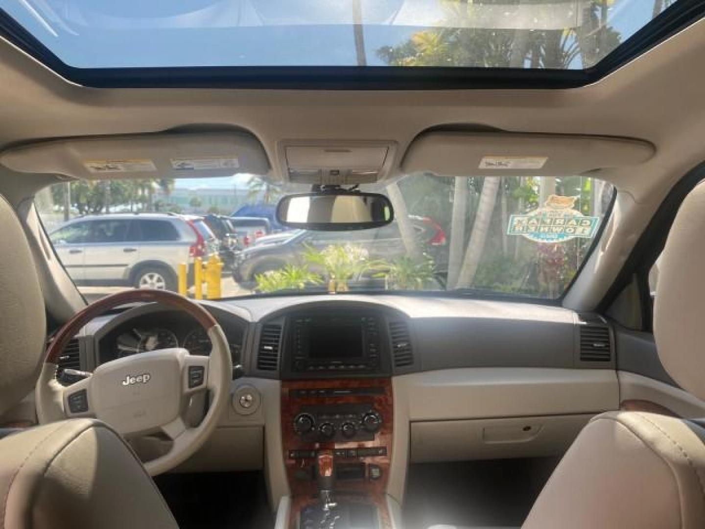 2006 Dark Khaki Pearl /Dark Khaki/Lght Graystone Jeep Grand Cherokee Overland LOW MILES 57,372 1 OWNER 4WD (1J8HR68226C) with an 5.7L Hemi Multi Displacement Engine engine, Automatic transmission, located at 4701 North Dixie Hwy, Pompano Beach, FL, 33064, (954) 422-2889, 26.240938, -80.123474 - OUR WEBPAGE FLORIDACARS1.COM HAS OVER 100 PHOTOS AND FREE CARFAX LINK 2006 Jeep Grand Cherokee Overland 1 OWNER 4WD 4 Door Wagon/Sport Utility 5.7L V8 F Gasoline 19 MPG Rear Wheel Drive w/ 4X4 Features 4WD/AWD ABS Brakes Air Conditioning Alloy Wheels AM/FM Stereo Automatic Transmission Auxiliary Aud- Photo#87