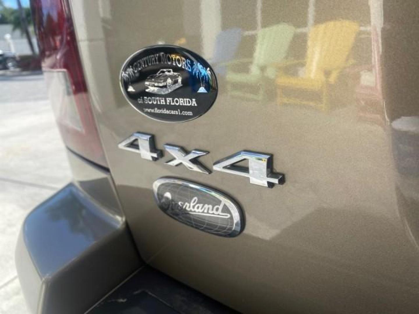 2006 Dark Khaki Pearl /Dark Khaki/Lght Graystone Jeep Grand Cherokee Overland LOW MILES 57,372 1 OWNER 4WD (1J8HR68226C) with an 5.7L Hemi Multi Displacement Engine engine, Automatic transmission, located at 4701 North Dixie Hwy, Pompano Beach, FL, 33064, (954) 422-2889, 26.240938, -80.123474 - OUR WEBPAGE FLORIDACARS1.COM HAS OVER 100 PHOTOS AND FREE CARFAX LINK 2006 Jeep Grand Cherokee Overland 1 OWNER 4WD 4 Door Wagon/Sport Utility 5.7L V8 F Gasoline 19 MPG Rear Wheel Drive w/ 4X4 Features 4WD/AWD ABS Brakes Air Conditioning Alloy Wheels AM/FM Stereo Automatic Transmission Auxiliary Aud- Photo#95