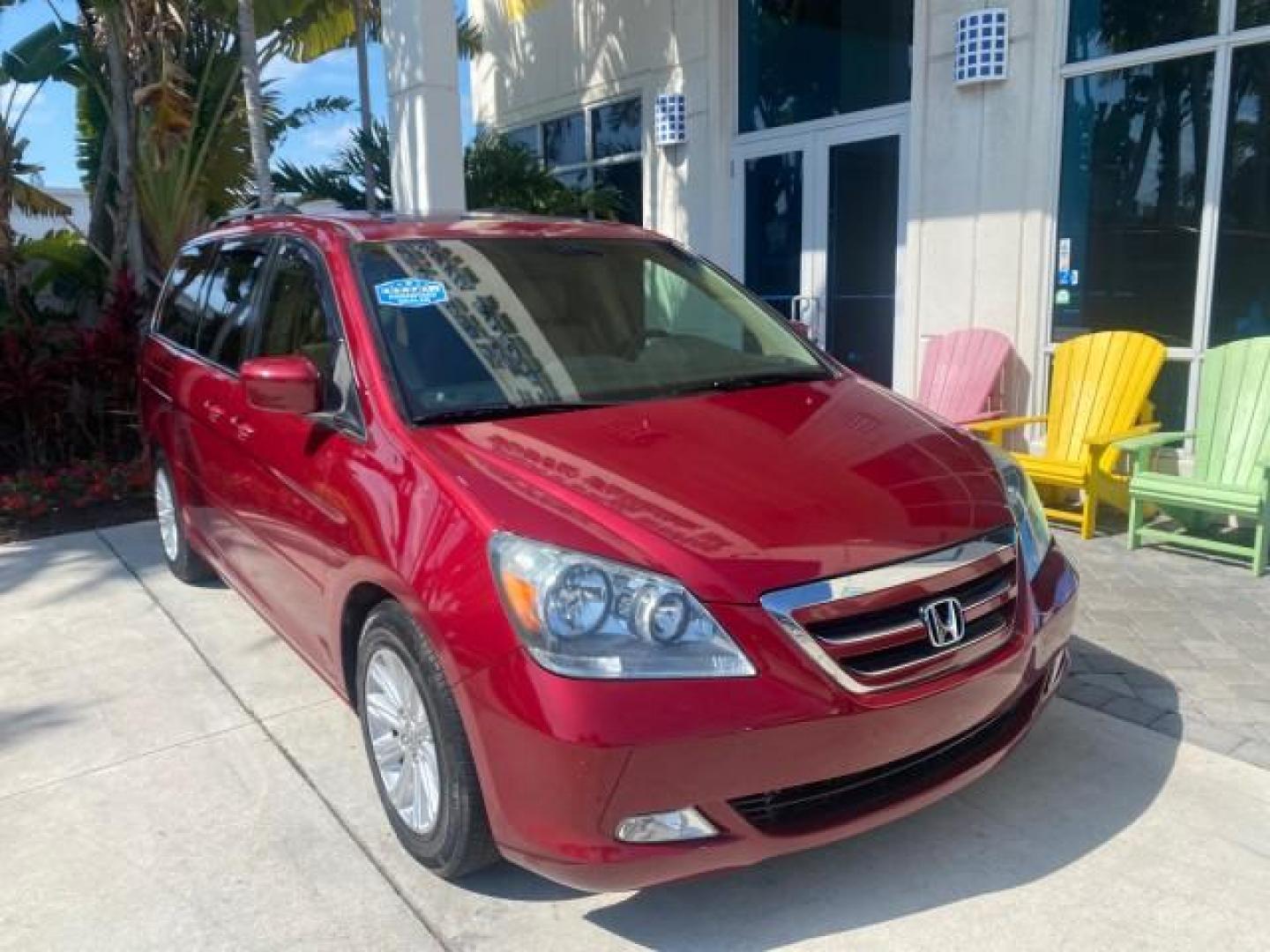 2005 Redrock Pearl /Ivory Honda Odyssey TOURING LOW MILES 62,337 FL (5FNRL38815B) with an 3.5L SOHC MPFI 24-Valve i-VTEC V6 Engine engine, Automatic transmission, located at 4701 North Dixie Hwy, Pompano Beach, FL, 33064, (954) 422-2889, 26.240938, -80.123474 - OUR WEBPAGE FLORIDACARS1.COM HAS OVER 100 PHOTOS AND FREE CARFAX LINK 2005 Honda Odyssey Touring LOADED LEATHER SUNROOF NAVIGATION Van 3.5L V6 F SOHC 24V Gasoline 28 MPG Front Wheel Drive Features ABS Brakes Air Conditioning Alloy Wheels AM/FM Stereo Automatic Transmission Auxiliary Audio Input CD A- Photo#1
