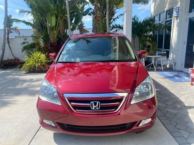 2005 Redrock Pearl /Ivory Honda Odyssey TOURING LOW MILES 62,337 FL (5FNRL38815B) with an 3.5L SOHC MPFI 24-Valve i-VTEC V6 Engine engine, Automatic transmission, located at 4701 North Dixie Hwy, Pompano Beach, FL, 33064, (954) 422-2889, 26.240938, -80.123474 - OUR WEBPAGE FLORIDACARS1.COM HAS OVER 100 PHOTOS AND FREE CARFAX LINK 2005 Honda Odyssey Touring LOADED LEATHER SUNROOF NAVIGATION Van 3.5L V6 F SOHC 24V Gasoline 28 MPG Front Wheel Drive Features ABS Brakes Air Conditioning Alloy Wheels AM/FM Stereo Automatic Transmission Auxiliary Audio Input CD A - Photo#2