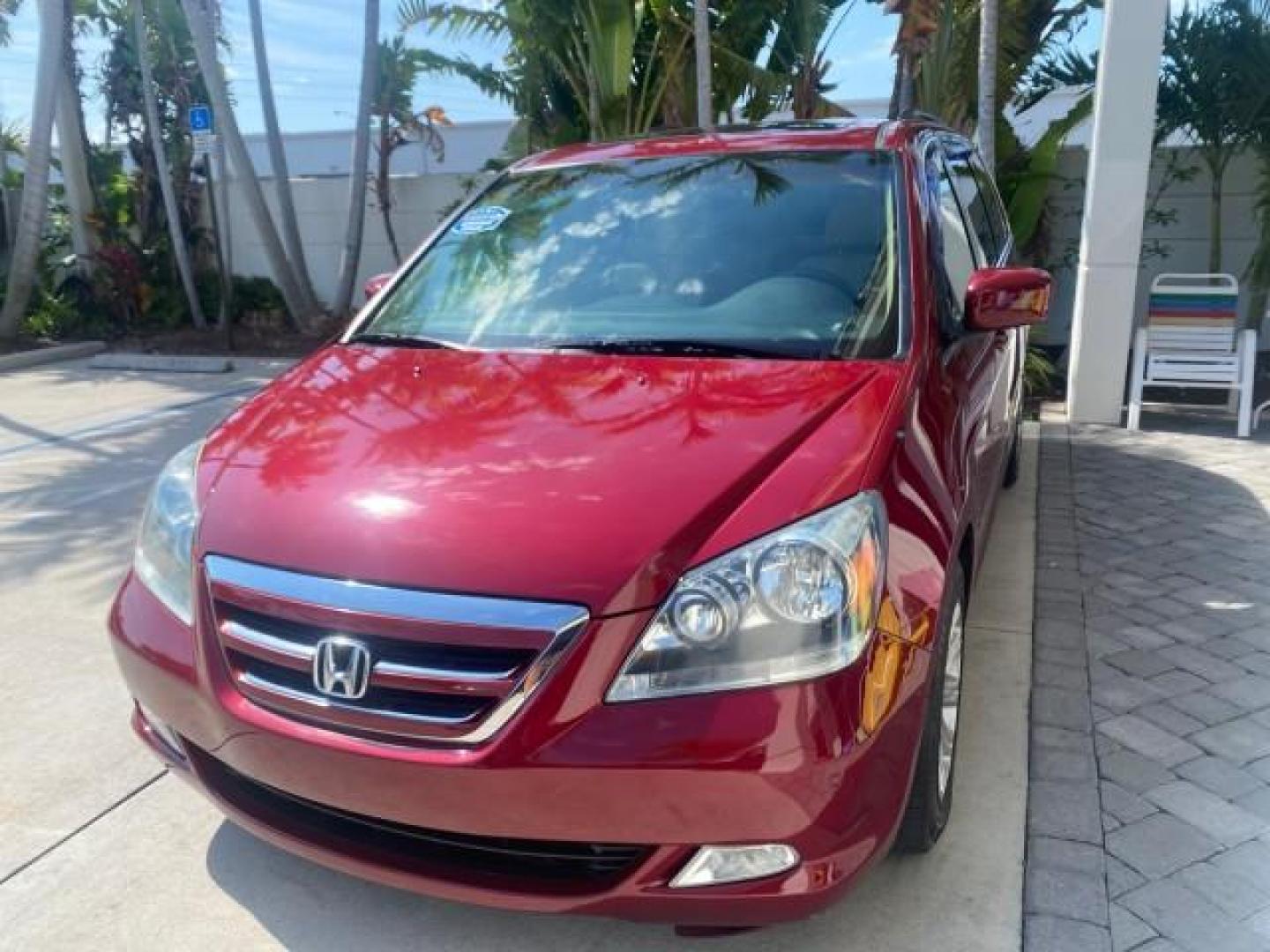 2005 Redrock Pearl /Ivory Honda Odyssey TOURING LOW MILES 62,337 FL (5FNRL38815B) with an 3.5L SOHC MPFI 24-Valve i-VTEC V6 Engine engine, Automatic transmission, located at 4701 North Dixie Hwy, Pompano Beach, FL, 33064, (954) 422-2889, 26.240938, -80.123474 - OUR WEBPAGE FLORIDACARS1.COM HAS OVER 100 PHOTOS AND FREE CARFAX LINK 2005 Honda Odyssey Touring LOADED LEATHER SUNROOF NAVIGATION Van 3.5L V6 F SOHC 24V Gasoline 28 MPG Front Wheel Drive Features ABS Brakes Air Conditioning Alloy Wheels AM/FM Stereo Automatic Transmission Auxiliary Audio Input CD A- Photo#3
