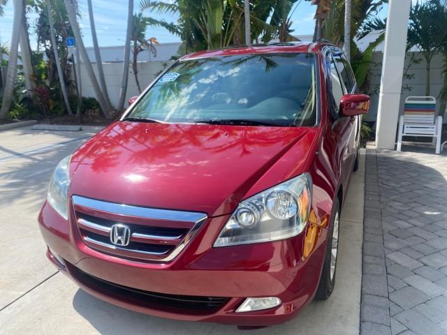 2005 Redrock Pearl /Ivory Honda Odyssey TOURING LOW MILES 62,337 FL (5FNRL38815B) with an 3.5L SOHC MPFI 24-Valve i-VTEC V6 Engine engine, Automatic transmission, located at 4701 North Dixie Hwy, Pompano Beach, FL, 33064, (954) 422-2889, 26.240938, -80.123474 - OUR WEBPAGE FLORIDACARS1.COM HAS OVER 100 PHOTOS AND FREE CARFAX LINK 2005 Honda Odyssey Touring LOADED LEATHER SUNROOF NAVIGATION Van 3.5L V6 F SOHC 24V Gasoline 28 MPG Front Wheel Drive Features ABS Brakes Air Conditioning Alloy Wheels AM/FM Stereo Automatic Transmission Auxiliary Audio Input CD A - Photo#3