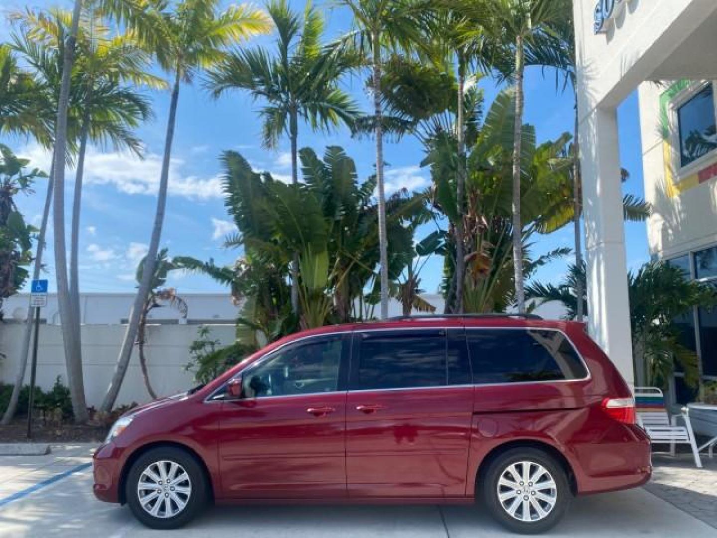 2005 Redrock Pearl /Ivory Honda Odyssey TOURING LOW MILES 62,337 FL (5FNRL38815B) with an 3.5L SOHC MPFI 24-Valve i-VTEC V6 Engine engine, Automatic transmission, located at 4701 North Dixie Hwy, Pompano Beach, FL, 33064, (954) 422-2889, 26.240938, -80.123474 - OUR WEBPAGE FLORIDACARS1.COM HAS OVER 100 PHOTOS AND FREE CARFAX LINK 2005 Honda Odyssey Touring LOADED LEATHER SUNROOF NAVIGATION Van 3.5L V6 F SOHC 24V Gasoline 28 MPG Front Wheel Drive Features ABS Brakes Air Conditioning Alloy Wheels AM/FM Stereo Automatic Transmission Auxiliary Audio Input CD A- Photo#4