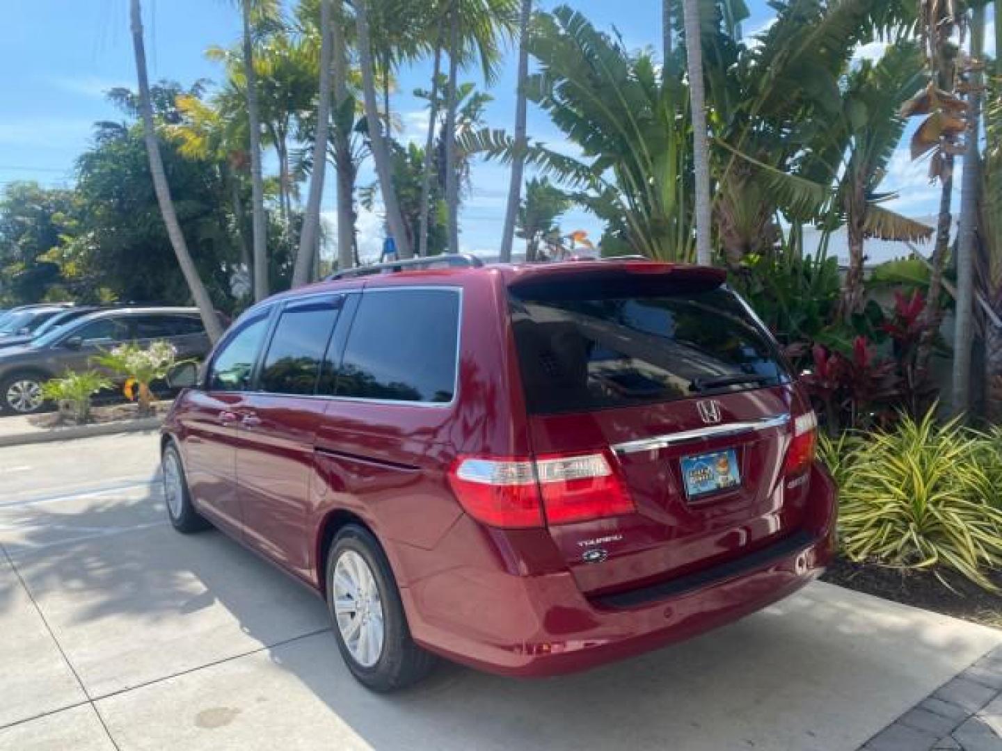 2005 Redrock Pearl /Ivory Honda Odyssey TOURING LOW MILES 62,337 FL (5FNRL38815B) with an 3.5L SOHC MPFI 24-Valve i-VTEC V6 Engine engine, Automatic transmission, located at 4701 North Dixie Hwy, Pompano Beach, FL, 33064, (954) 422-2889, 26.240938, -80.123474 - OUR WEBPAGE FLORIDACARS1.COM HAS OVER 100 PHOTOS AND FREE CARFAX LINK 2005 Honda Odyssey Touring LOADED LEATHER SUNROOF NAVIGATION Van 3.5L V6 F SOHC 24V Gasoline 28 MPG Front Wheel Drive Features ABS Brakes Air Conditioning Alloy Wheels AM/FM Stereo Automatic Transmission Auxiliary Audio Input CD A- Photo#5