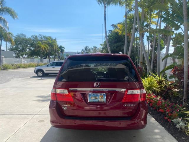 2005 Redrock Pearl /Ivory Honda Odyssey TOURING LOW MILES 62,337 FL (5FNRL38815B) with an 3.5L SOHC MPFI 24-Valve i-VTEC V6 Engine engine, Automatic transmission, located at 4701 North Dixie Hwy, Pompano Beach, FL, 33064, (954) 422-2889, 26.240938, -80.123474 - OUR WEBPAGE FLORIDACARS1.COM HAS OVER 100 PHOTOS AND FREE CARFAX LINK 2005 Honda Odyssey Touring LOADED LEATHER SUNROOF NAVIGATION Van 3.5L V6 F SOHC 24V Gasoline 28 MPG Front Wheel Drive Features ABS Brakes Air Conditioning Alloy Wheels AM/FM Stereo Automatic Transmission Auxiliary Audio Input CD A - Photo#6