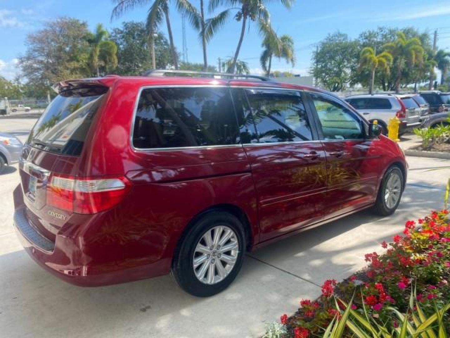 2005 Redrock Pearl /Ivory Honda Odyssey TOURING LOW MILES 62,337 FL (5FNRL38815B) with an 3.5L SOHC MPFI 24-Valve i-VTEC V6 Engine engine, Automatic transmission, located at 4701 North Dixie Hwy, Pompano Beach, FL, 33064, (954) 422-2889, 26.240938, -80.123474 - OUR WEBPAGE FLORIDACARS1.COM HAS OVER 100 PHOTOS AND FREE CARFAX LINK 2005 Honda Odyssey Touring LOADED LEATHER SUNROOF NAVIGATION Van 3.5L V6 F SOHC 24V Gasoline 28 MPG Front Wheel Drive Features ABS Brakes Air Conditioning Alloy Wheels AM/FM Stereo Automatic Transmission Auxiliary Audio Input CD A- Photo#7