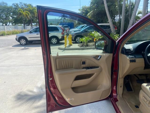 2005 Redrock Pearl /Ivory Honda Odyssey TOURING LOW MILES 62,337 FL (5FNRL38815B) with an 3.5L SOHC MPFI 24-Valve i-VTEC V6 Engine engine, Automatic transmission, located at 4701 North Dixie Hwy, Pompano Beach, FL, 33064, (954) 422-2889, 26.240938, -80.123474 - OUR WEBPAGE FLORIDACARS1.COM HAS OVER 100 PHOTOS AND FREE CARFAX LINK 2005 Honda Odyssey Touring LOADED LEATHER SUNROOF NAVIGATION Van 3.5L V6 F SOHC 24V Gasoline 28 MPG Front Wheel Drive Features ABS Brakes Air Conditioning Alloy Wheels AM/FM Stereo Automatic Transmission Auxiliary Audio Input CD A - Photo#9