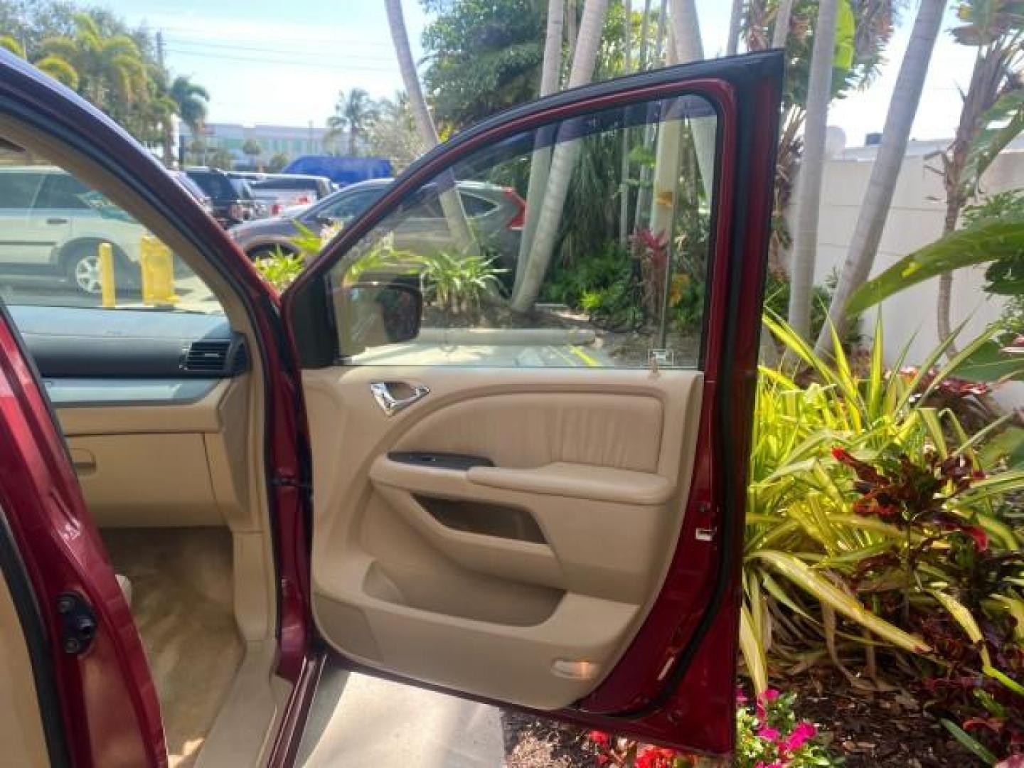 2005 Redrock Pearl /Ivory Honda Odyssey TOURING LOW MILES 62,337 FL (5FNRL38815B) with an 3.5L SOHC MPFI 24-Valve i-VTEC V6 Engine engine, Automatic transmission, located at 4701 North Dixie Hwy, Pompano Beach, FL, 33064, (954) 422-2889, 26.240938, -80.123474 - OUR WEBPAGE FLORIDACARS1.COM HAS OVER 100 PHOTOS AND FREE CARFAX LINK 2005 Honda Odyssey Touring LOADED LEATHER SUNROOF NAVIGATION Van 3.5L V6 F SOHC 24V Gasoline 28 MPG Front Wheel Drive Features ABS Brakes Air Conditioning Alloy Wheels AM/FM Stereo Automatic Transmission Auxiliary Audio Input CD A- Photo#11
