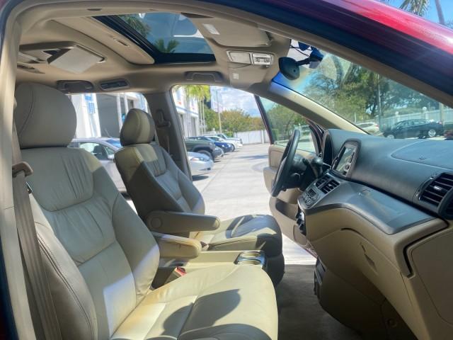 2005 Redrock Pearl /Ivory Honda Odyssey TOURING LOW MILES 62,337 FL (5FNRL38815B) with an 3.5L SOHC MPFI 24-Valve i-VTEC V6 Engine engine, Automatic transmission, located at 4701 North Dixie Hwy, Pompano Beach, FL, 33064, (954) 422-2889, 26.240938, -80.123474 - OUR WEBPAGE FLORIDACARS1.COM HAS OVER 100 PHOTOS AND FREE CARFAX LINK 2005 Honda Odyssey Touring LOADED LEATHER SUNROOF NAVIGATION Van 3.5L V6 F SOHC 24V Gasoline 28 MPG Front Wheel Drive Features ABS Brakes Air Conditioning Alloy Wheels AM/FM Stereo Automatic Transmission Auxiliary Audio Input CD A - Photo#12
