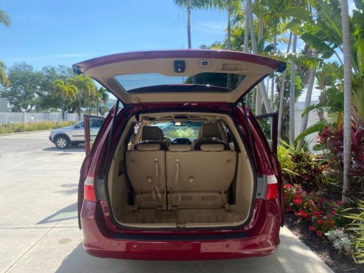 2005 Redrock Pearl /Ivory Honda Odyssey TOURING LOW MILES 62,337 FL (5FNRL38815B) with an 3.5L SOHC MPFI 24-Valve i-VTEC V6 Engine engine, Automatic transmission, located at 4701 North Dixie Hwy, Pompano Beach, FL, 33064, (954) 422-2889, 26.240938, -80.123474 - OUR WEBPAGE FLORIDACARS1.COM HAS OVER 100 PHOTOS AND FREE CARFAX LINK 2005 Honda Odyssey Touring LOADED LEATHER SUNROOF NAVIGATION Van 3.5L V6 F SOHC 24V Gasoline 28 MPG Front Wheel Drive Features ABS Brakes Air Conditioning Alloy Wheels AM/FM Stereo Automatic Transmission Auxiliary Audio Input CD A- Photo#15
