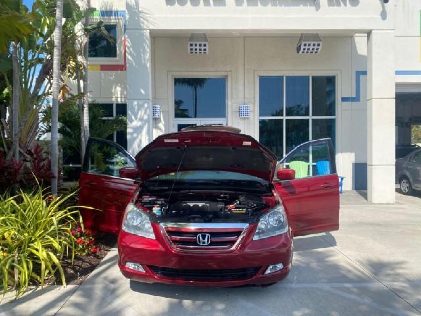 2005 Redrock Pearl /Ivory Honda Odyssey TOURING LOW MILES 62,337 FL (5FNRL38815B) with an 3.5L SOHC MPFI 24-Valve i-VTEC V6 Engine engine, Automatic transmission, located at 4701 North Dixie Hwy, Pompano Beach, FL, 33064, (954) 422-2889, 26.240938, -80.123474 - OUR WEBPAGE FLORIDACARS1.COM HAS OVER 100 PHOTOS AND FREE CARFAX LINK 2005 Honda Odyssey Touring LOADED LEATHER SUNROOF NAVIGATION Van 3.5L V6 F SOHC 24V Gasoline 28 MPG Front Wheel Drive Features ABS Brakes Air Conditioning Alloy Wheels AM/FM Stereo Automatic Transmission Auxiliary Audio Input CD A- Photo#16