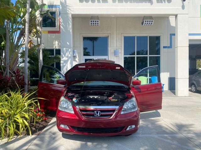 2005 Redrock Pearl /Ivory Honda Odyssey TOURING LOW MILES 62,337 FL (5FNRL38815B) with an 3.5L SOHC MPFI 24-Valve i-VTEC V6 Engine engine, Automatic transmission, located at 4701 North Dixie Hwy, Pompano Beach, FL, 33064, (954) 422-2889, 26.240938, -80.123474 - OUR WEBPAGE FLORIDACARS1.COM HAS OVER 100 PHOTOS AND FREE CARFAX LINK 2005 Honda Odyssey Touring LOADED LEATHER SUNROOF NAVIGATION Van 3.5L V6 F SOHC 24V Gasoline 28 MPG Front Wheel Drive Features ABS Brakes Air Conditioning Alloy Wheels AM/FM Stereo Automatic Transmission Auxiliary Audio Input CD A - Photo#16